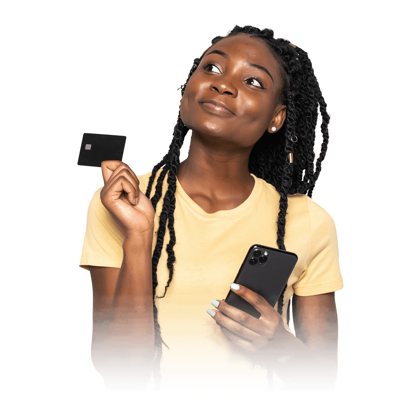 A woman holding a mobile phone in one hand and a card in the other.