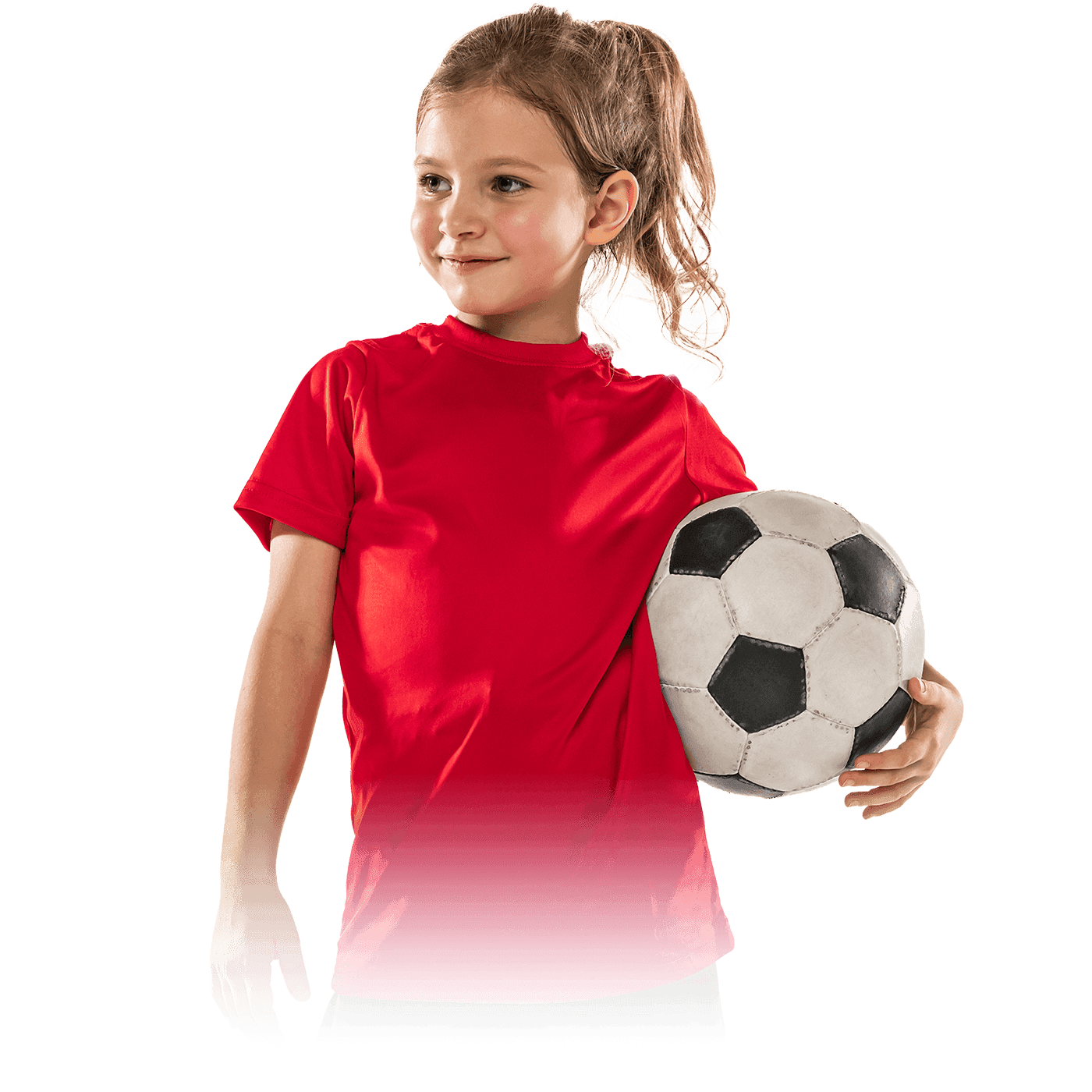Young girl in a red shirt holding a football.