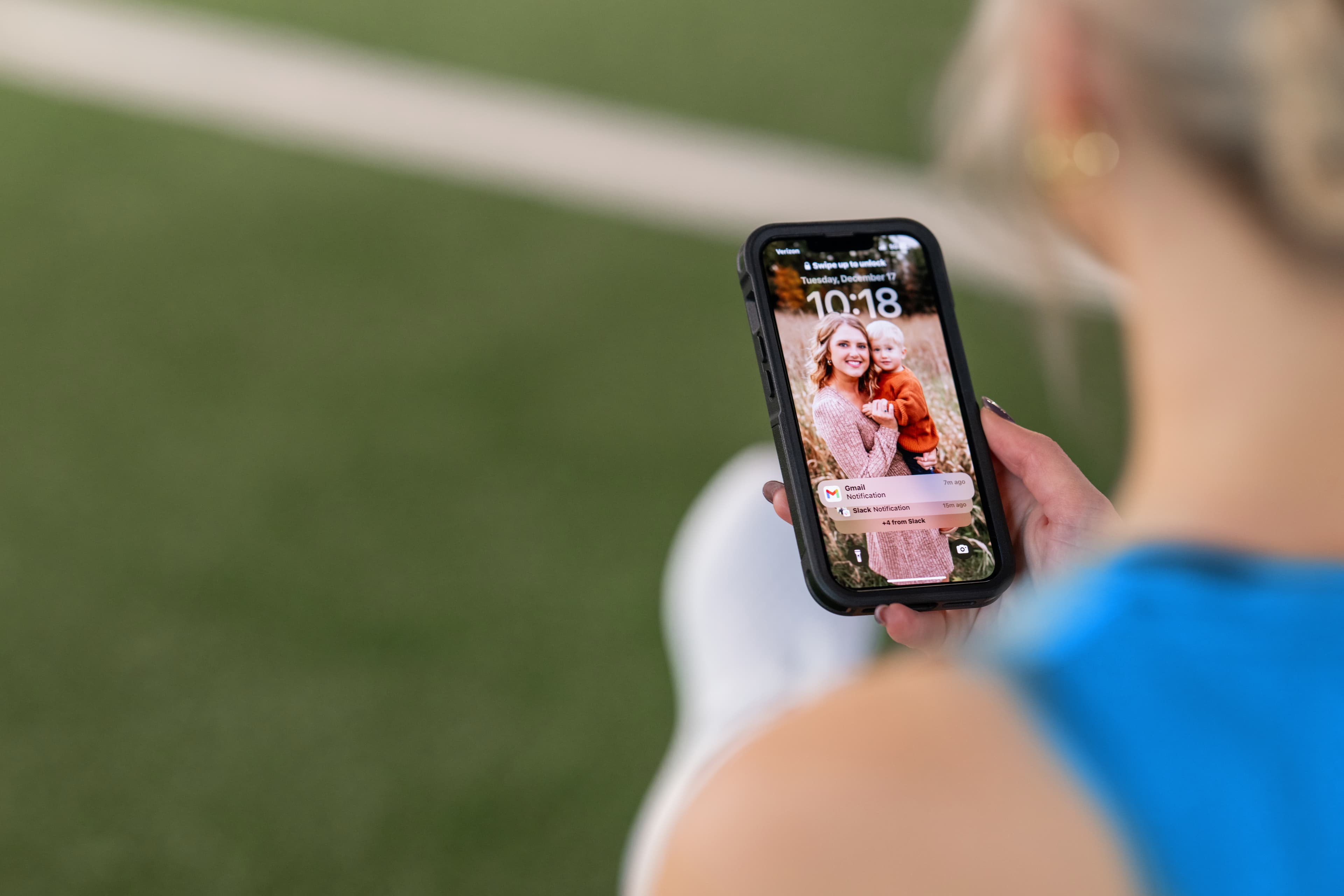 YMCA member using a mobile phone for facility access