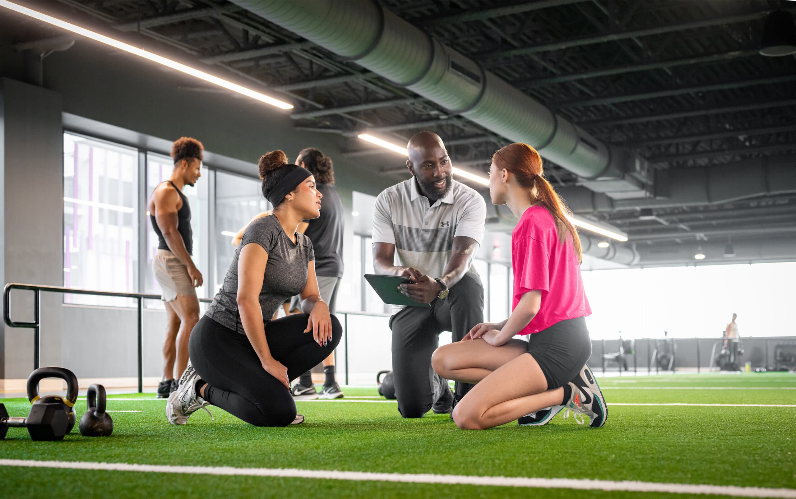 Community center staff supporting members using community center management software