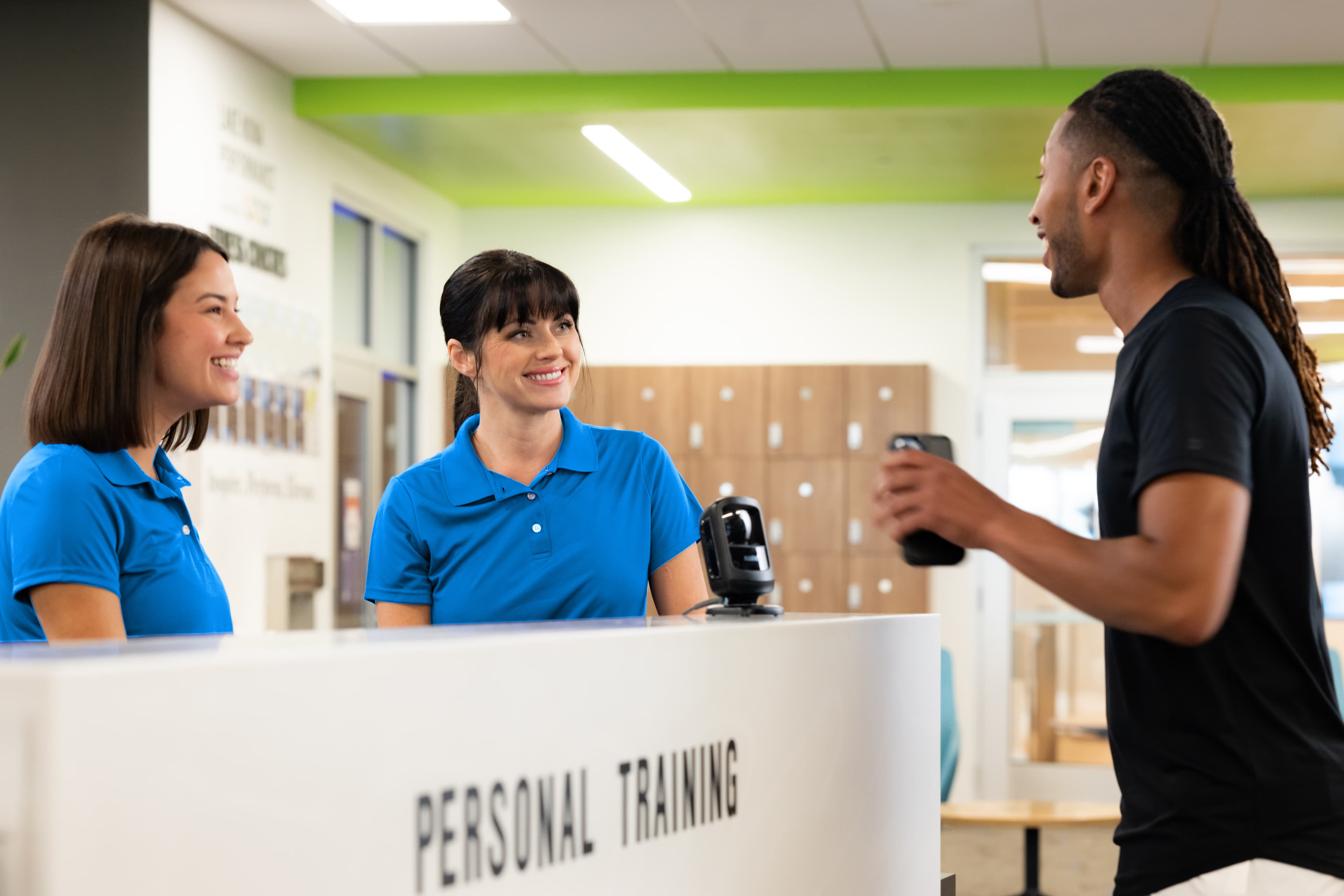 Nonprofit operations team reviewing facility utilization reports