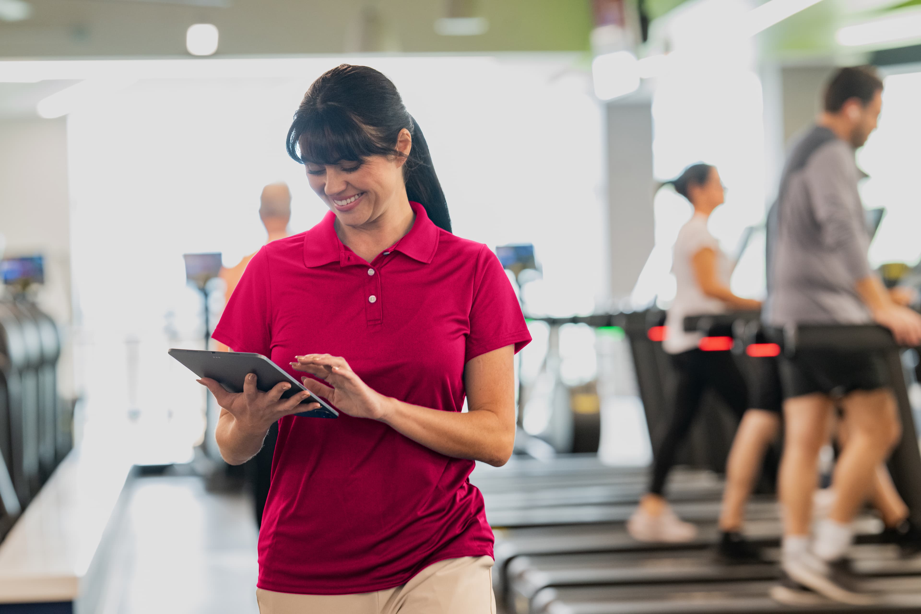 Nonprofit leaders reviewing digital program registration data in nonprofit registration software