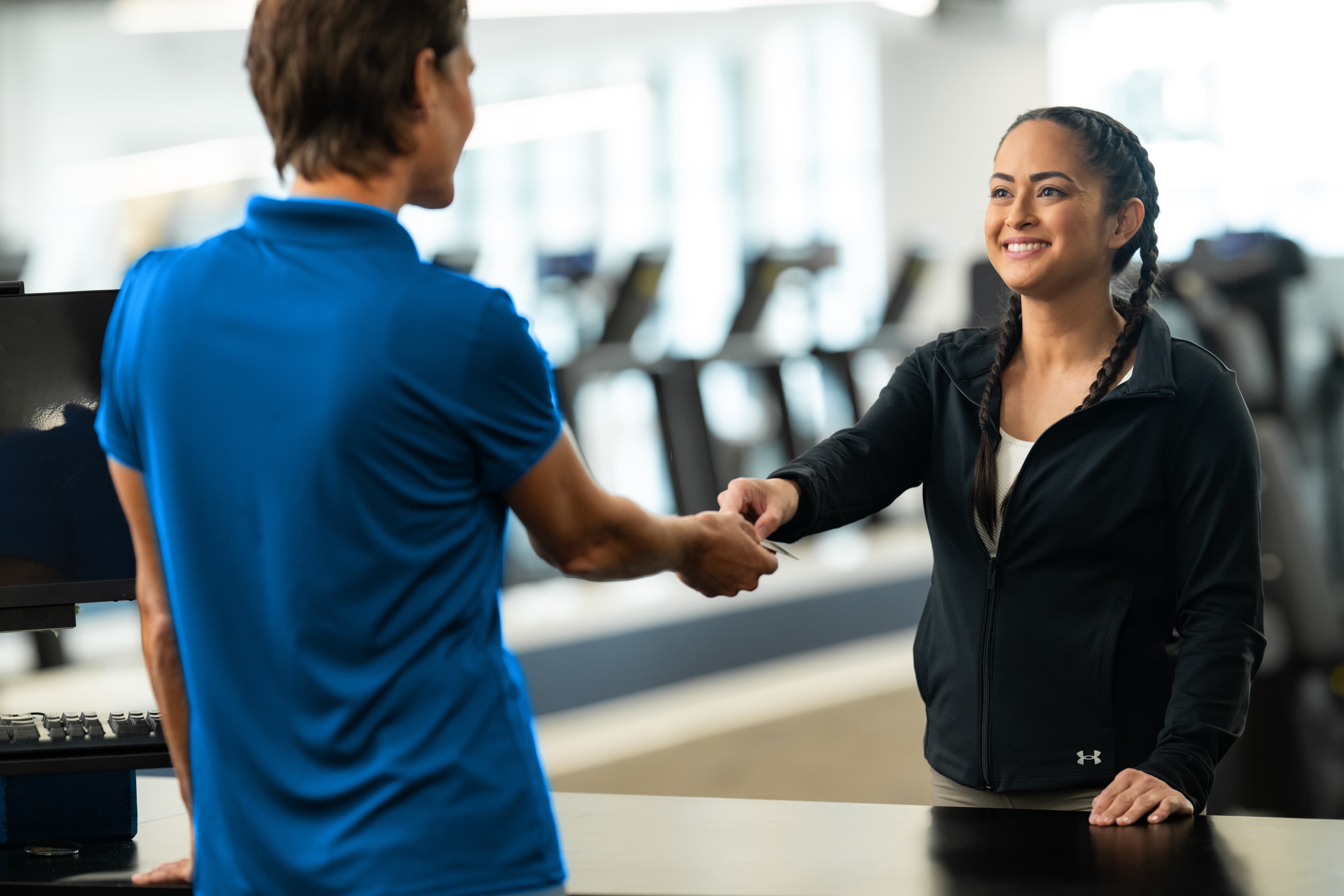Nonprofit staff reviewing member engagement and retention data in membership management software for nonprofits