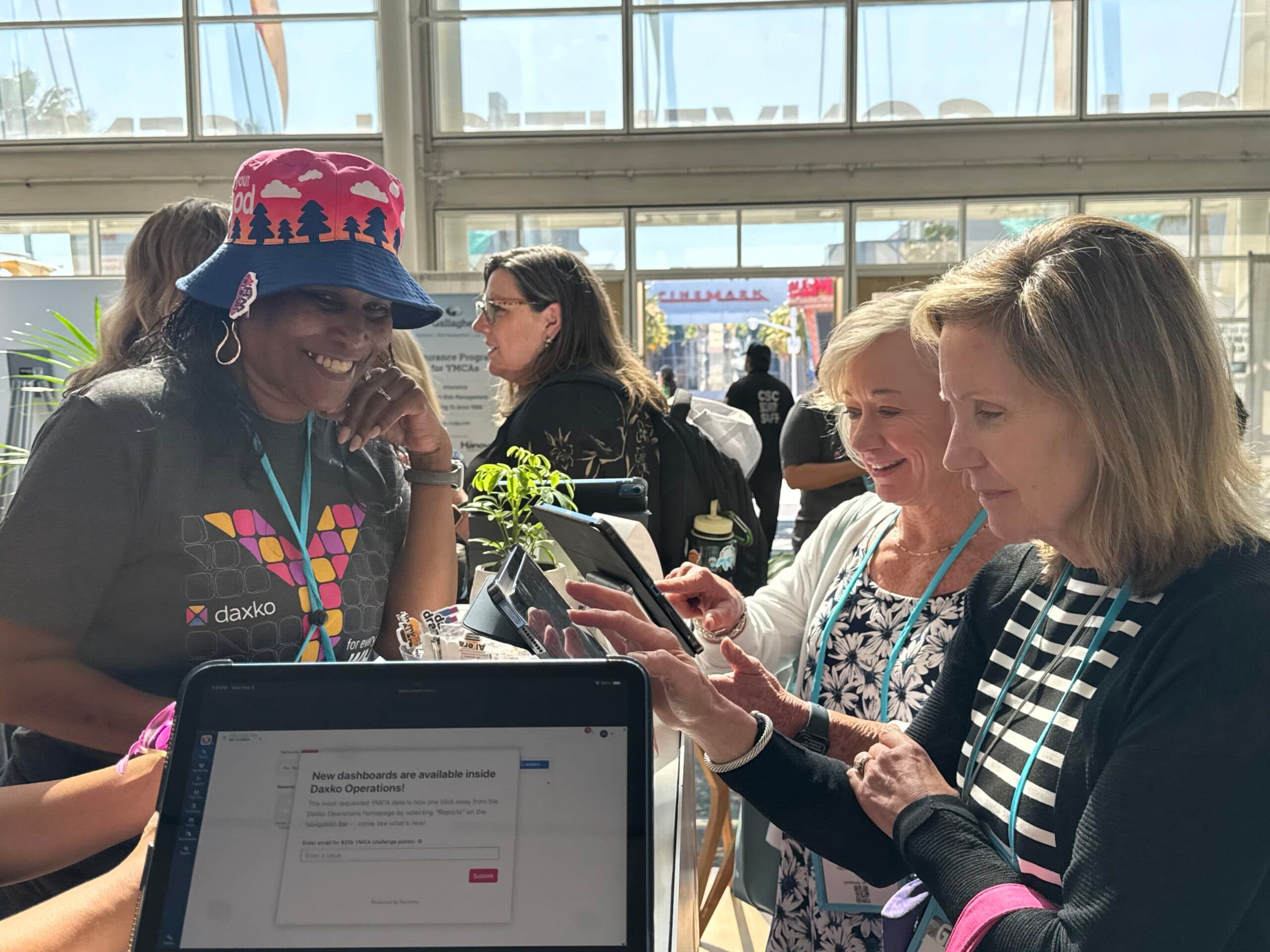 Daxko team members show new reporting tools for YMCAs at NAYDO