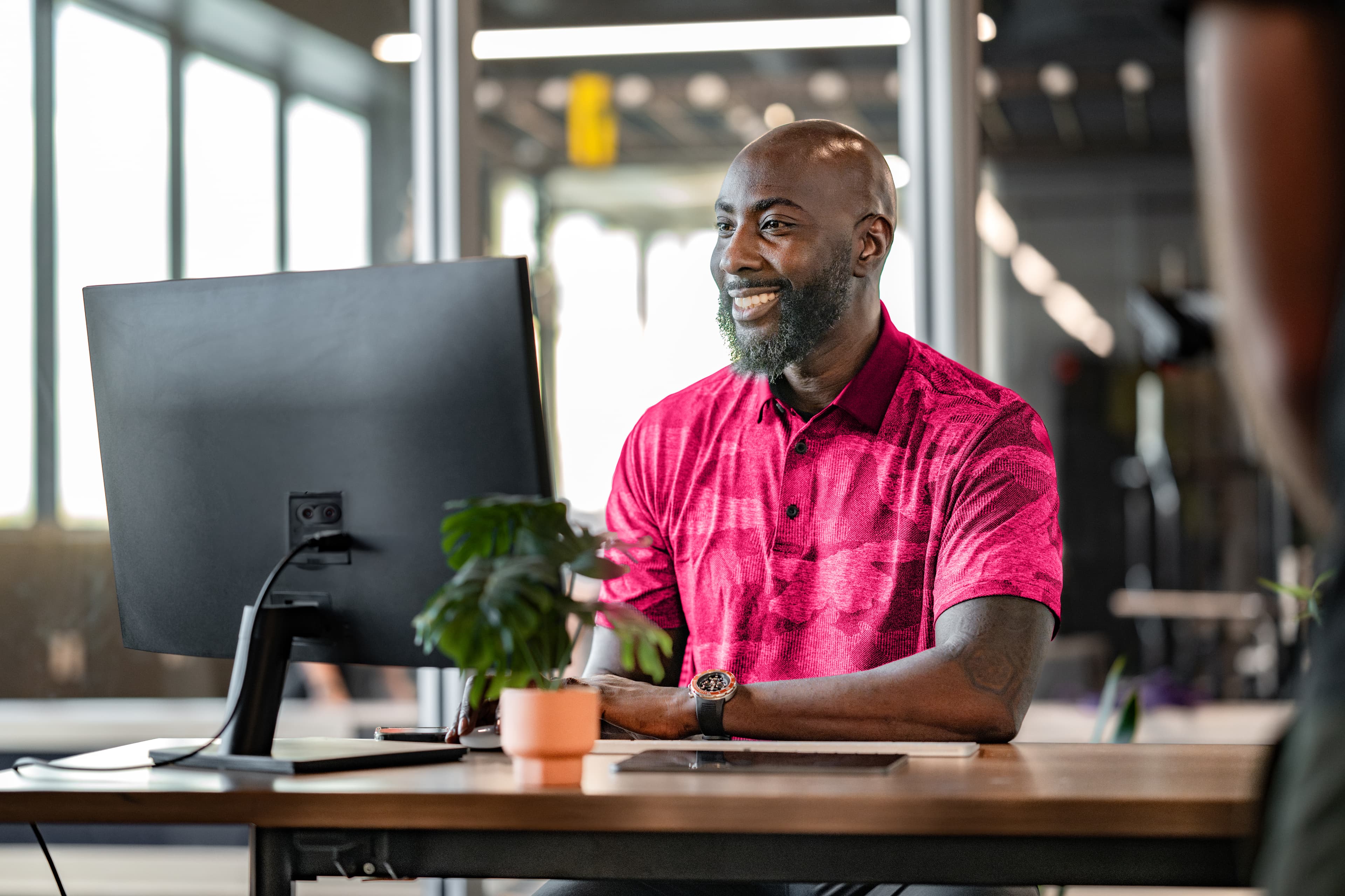 Group fitness class stretching in studio